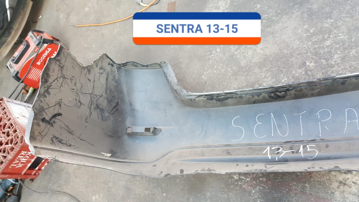 PARACHOQUES POSTERIOR NISSAN SENTRA 2013 AL 2015 CON DETALLE